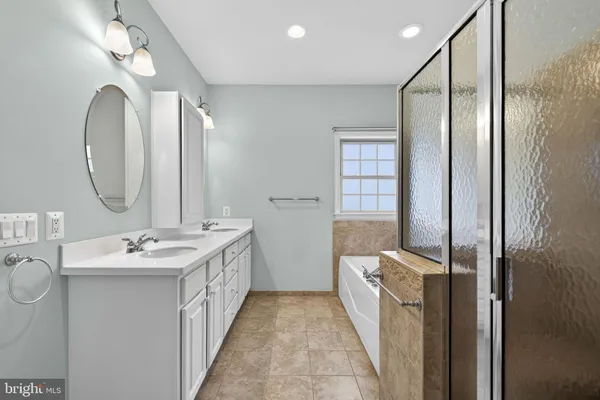 an aerial view of a house with a ocean view