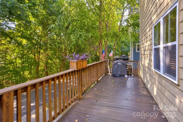 an aerial view of a house with a yard and garden
