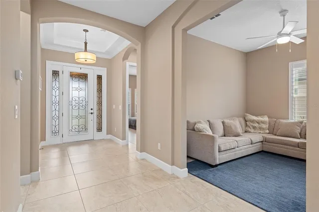 a living room with furniture and a couch