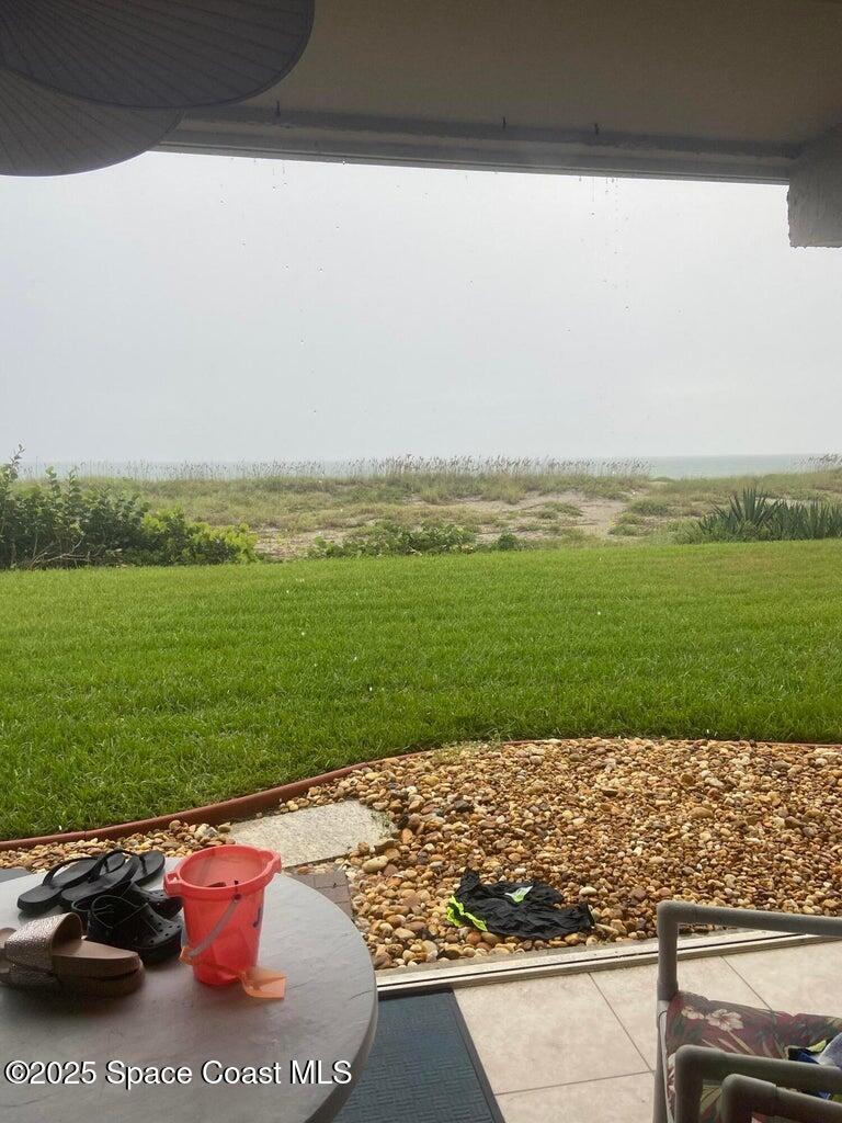 1305 South Atlantic Avenue, Unit 120 Cocoa Beach, FL 32931 - Photo 5 of 10 a view of a lake with a outdoor space