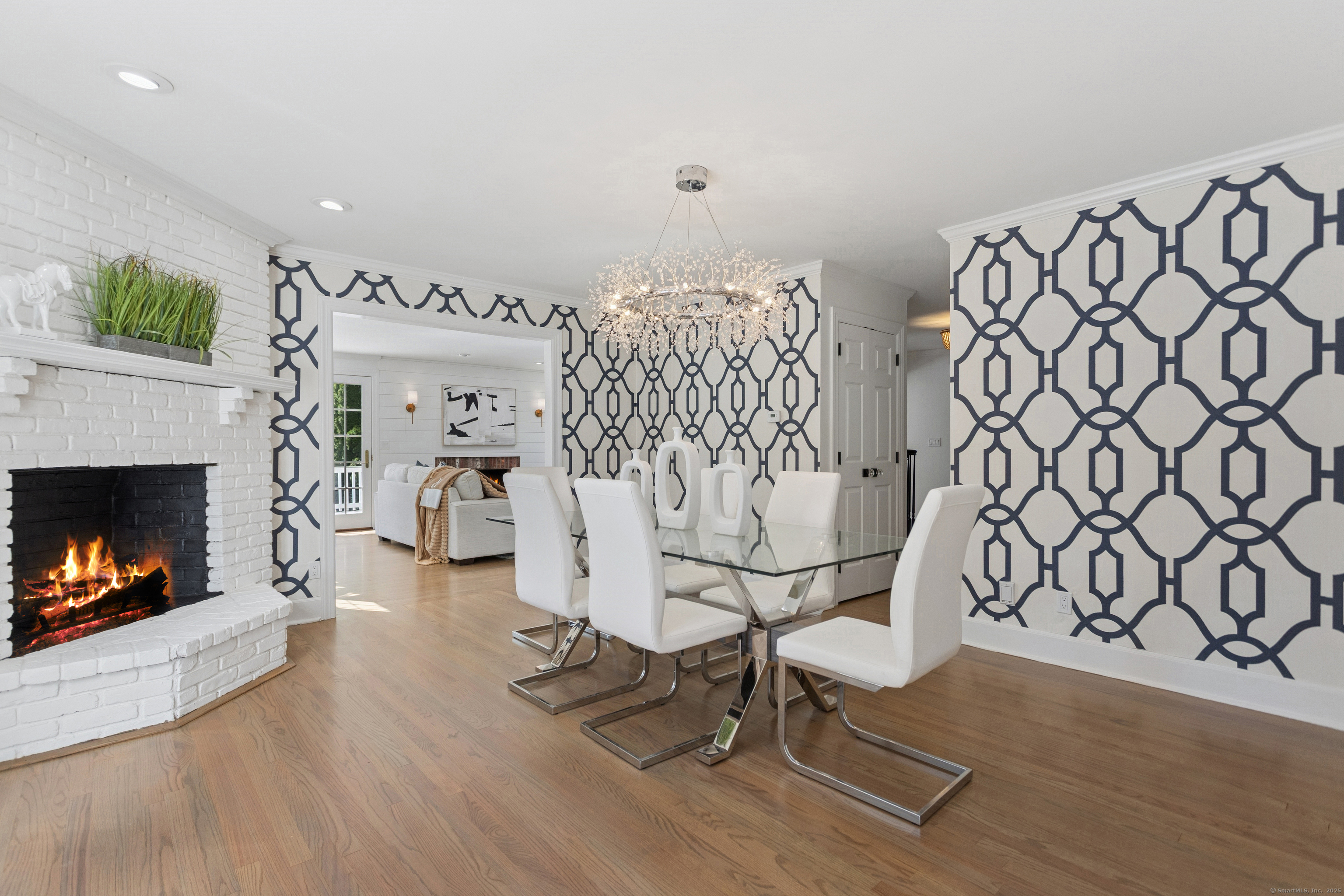 61 Edgewater Commons Lane Westport, CT 06880 - Photo 7 of 37 a living room with furniture and a fireplace