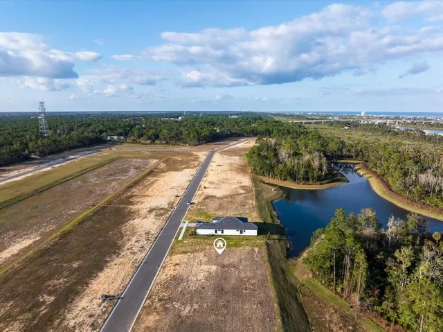 a view of a lake with a houses
