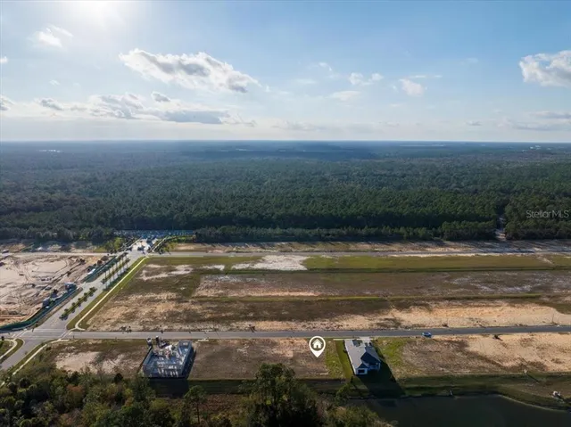 closeup view of water heater and wooden floor