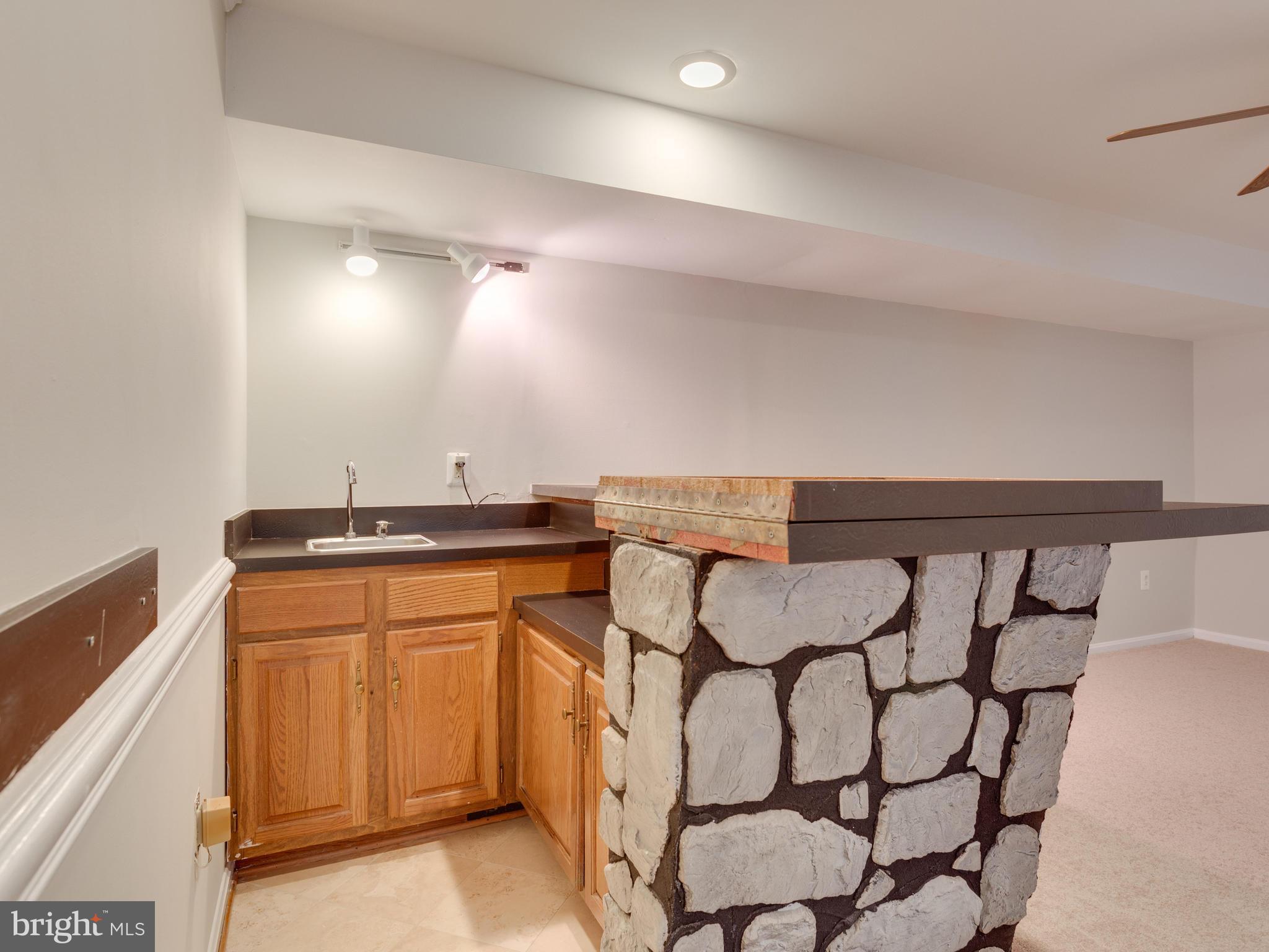 9212 Mac Swain Place Springfield, VA 22153 - Photo 25 of 30 Wet bar in the rec room