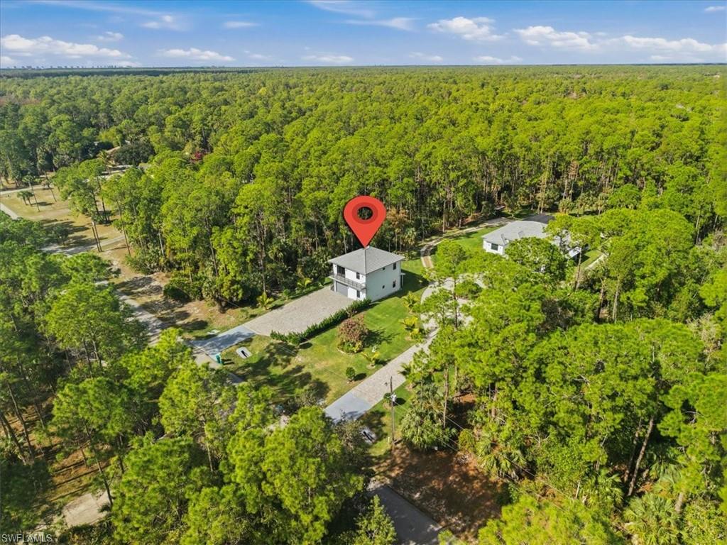 3261 15th Avenue Southwest Naples, FL 34117 - Photo 18 of 20 View of property location featuring a forest