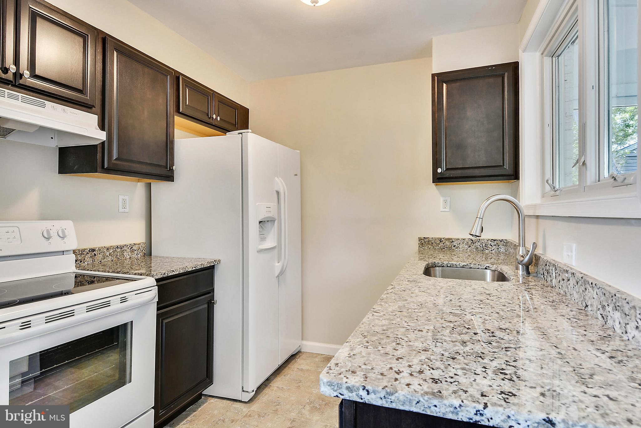 12103 Bushey Drive Silver Spring, MD 20902 - Photo 8 of 25 Kitchen-updated w/new appliances and granite