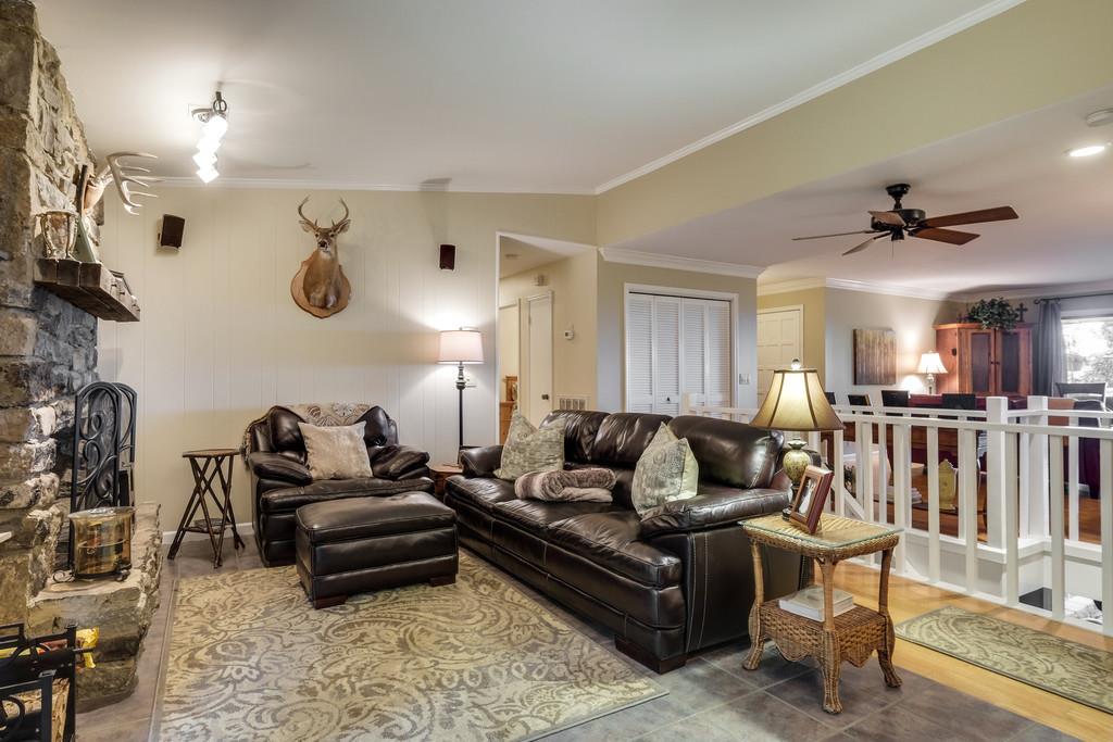801 High Point Ridge Road Franklin, TN 37069 - Photo 11 of 29 a living room with furniture and a flat screen tv