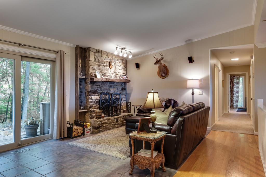 801 High Point Ridge Road Franklin, TN 37069 - Photo 13 of 29 a living room with fireplace furniture and a large window