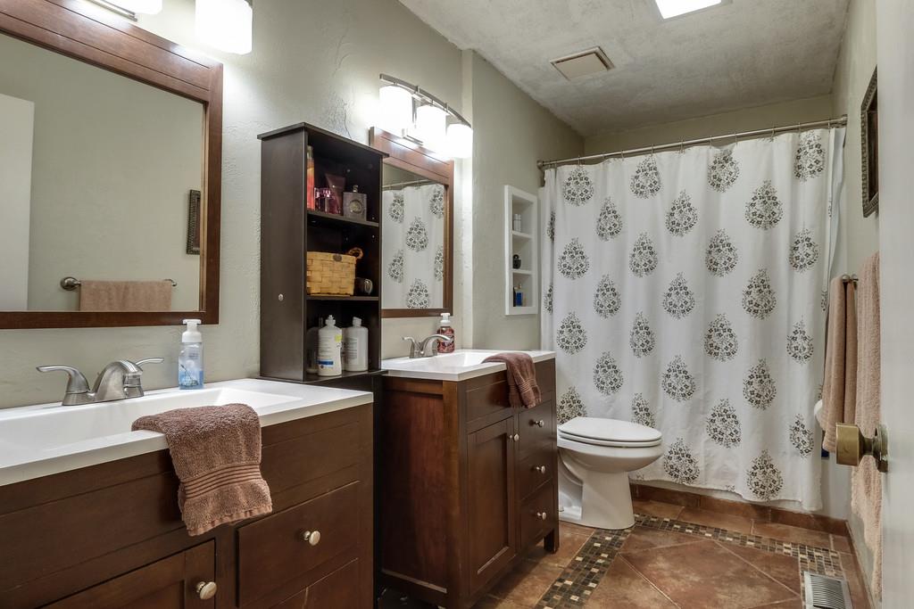 801 High Point Ridge Road Franklin, TN 37069 - Photo 21 of 29 a bathroom with a sink toilet and shower