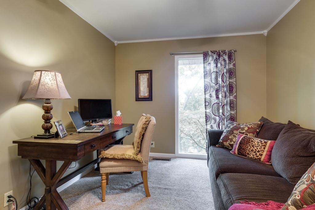 801 High Point Ridge Road Franklin, TN 37069 - Photo 24 of 29 a living room with furniture and a window