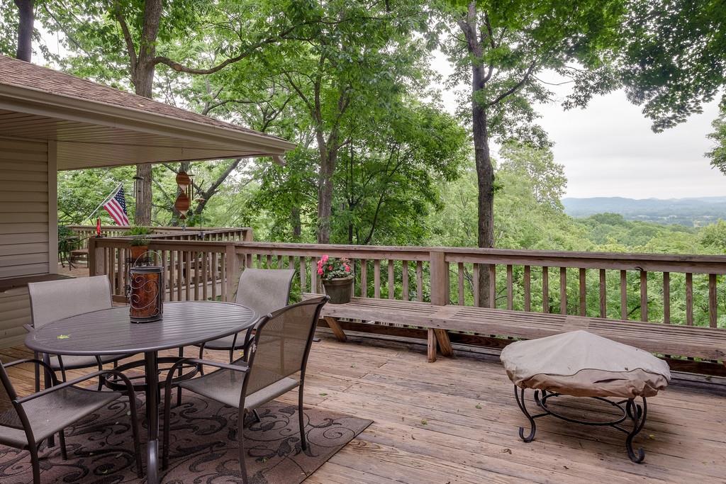 801 High Point Ridge Road Franklin, TN 37069 - Photo 5 of 29 a view of a chairs and table in patio