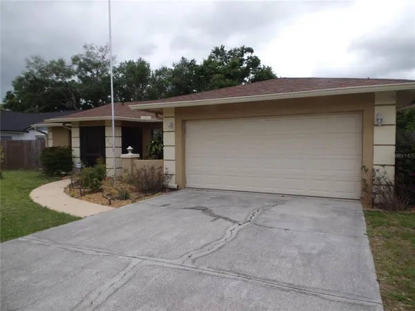 a front view of house with yard
