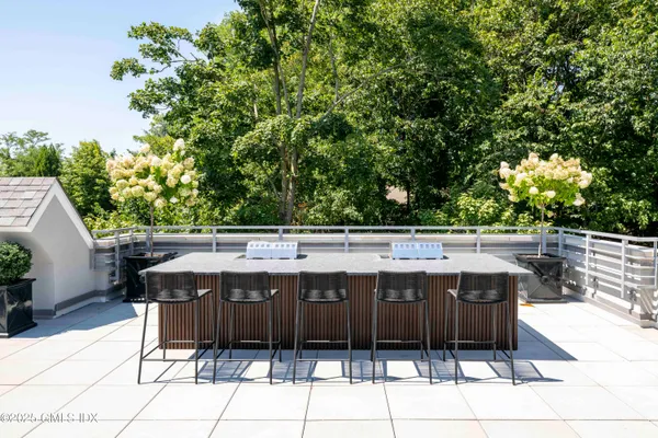 a outdoor dining space with furniture