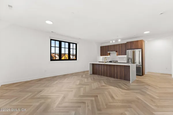 a view of a kitchen with a sink