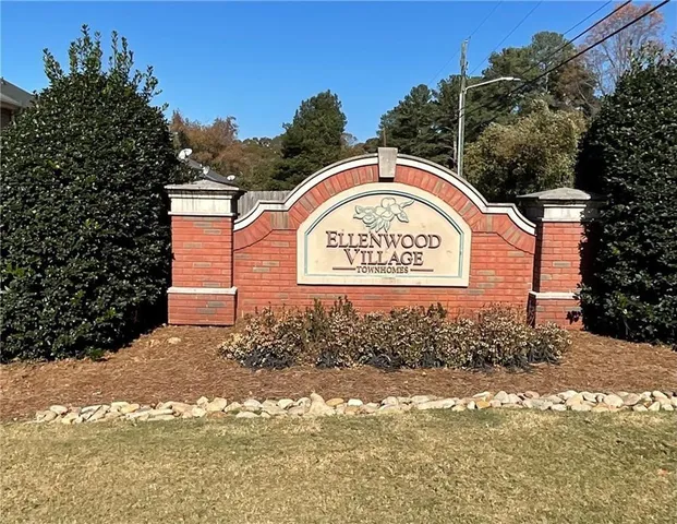 a sign that is on the side of a road