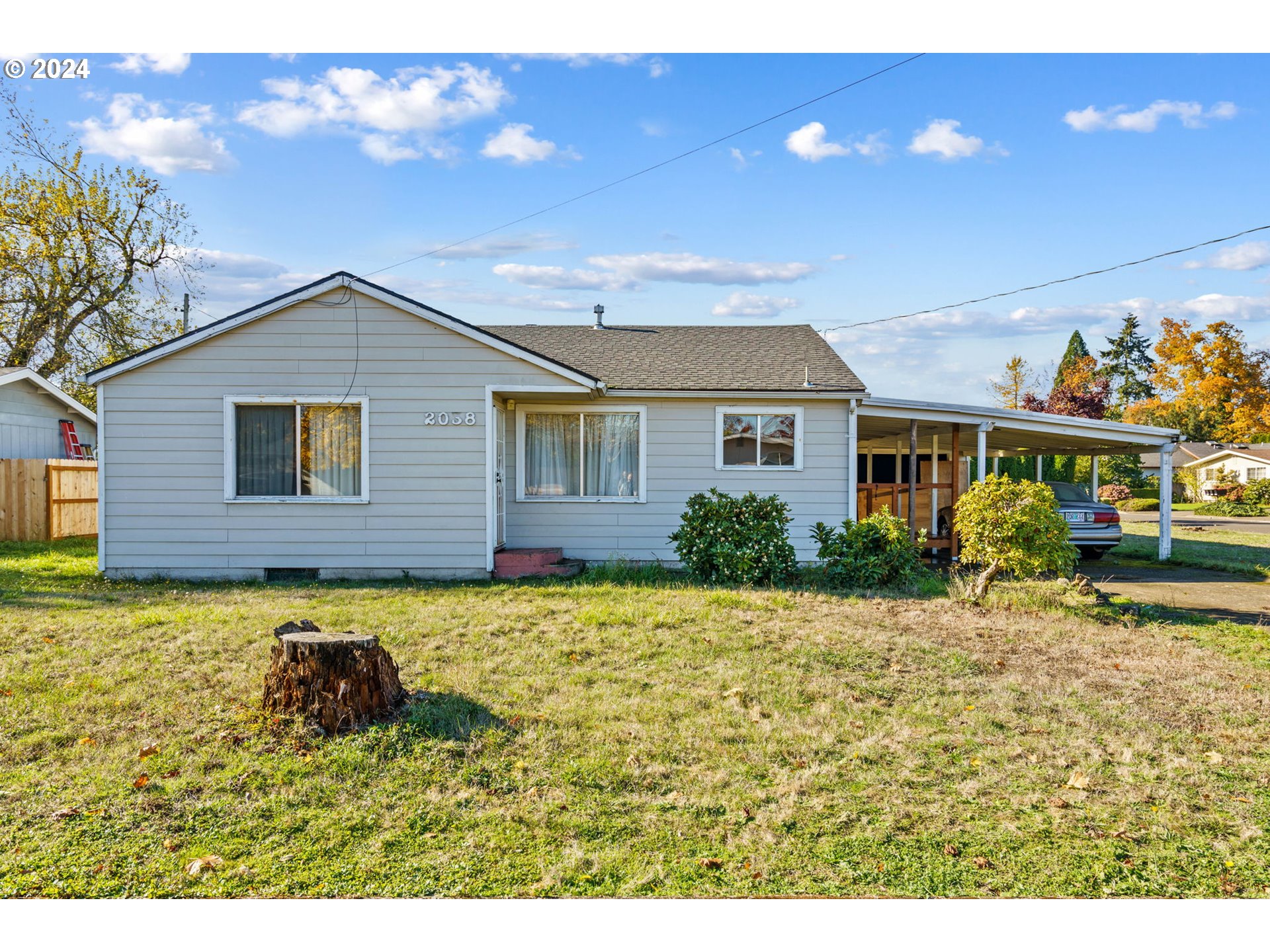 2038 17th Street Springfield, OR 97477 - Photo 3 of 23 a house view with a garden space