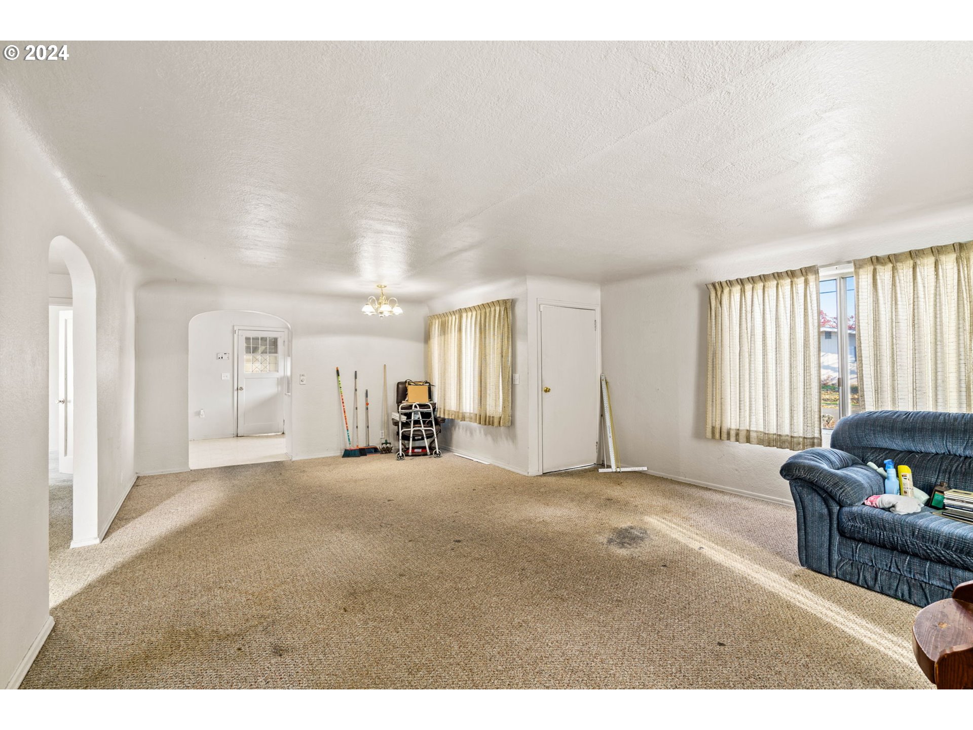 2038 17th Street Springfield, OR 97477 - Photo 8 of 23 a living room with furniture and a window