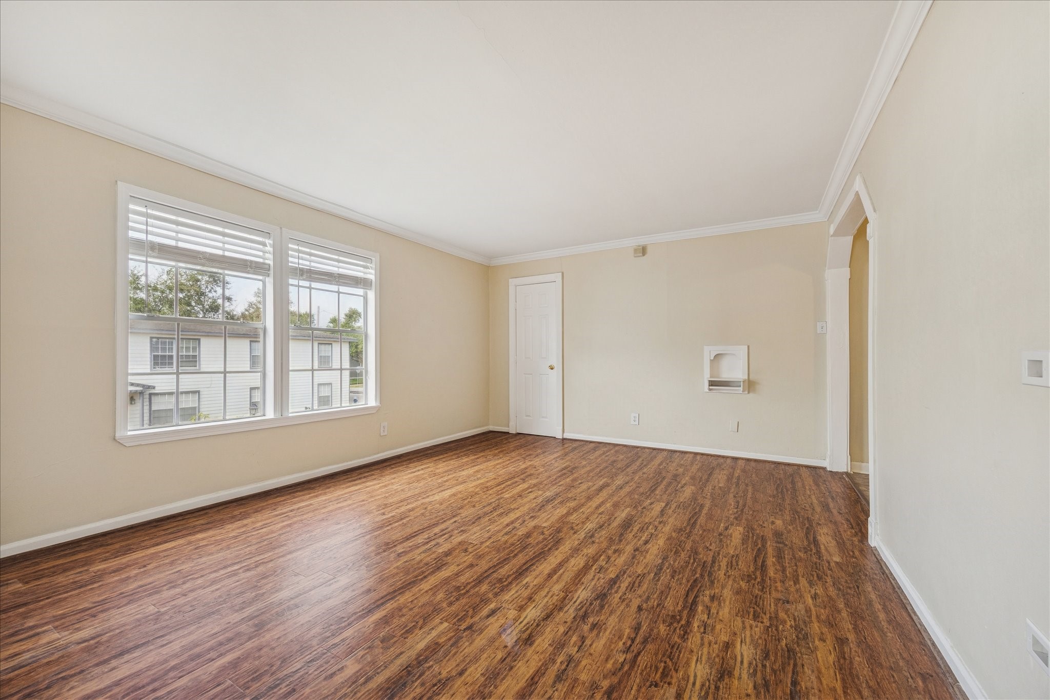 218 West 15th Street, Unit D Houston, TX 77008 - Photo 1 of 10 an empty room with wooden floor and windows