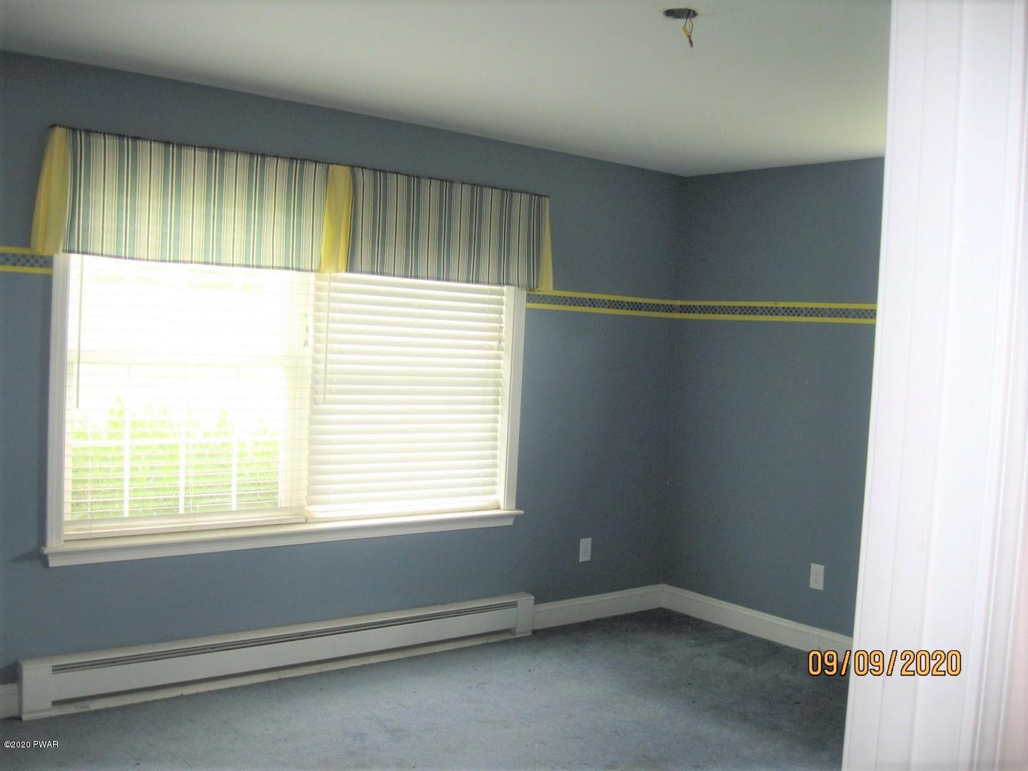 271 North Baker Road Waymart, PA 18472 - Photo 21 of 25 a view of an empty room with a window