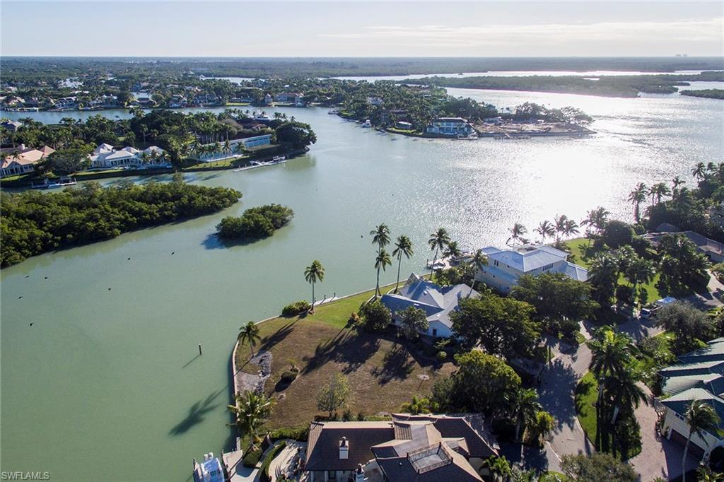 5 Sabre Lane Naples, FL 34102 - Photo 2 of 6 an aerial view of multiple house