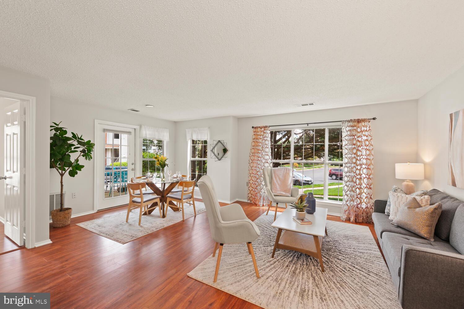 20957 Timber Ridge Terrace, Unit 101 Ashburn, VA 20147 - Photo 33 of 33 Sunny open floor plan!