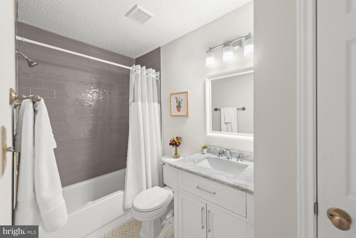 20957 Timber Ridge Terrace, Unit 101 Ashburn, VA 20147 - Photo 28 of 33 Brand new primary bath! Just done.