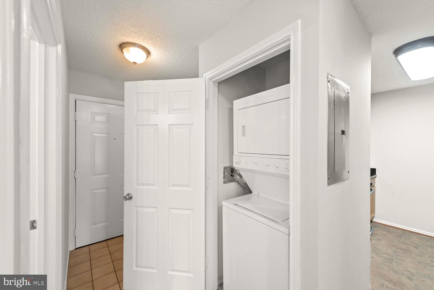 20957 Timber Ridge Terrace, Unit 101 Ashburn, VA 20147 - Photo 32 of 33 In unit washer dryer!