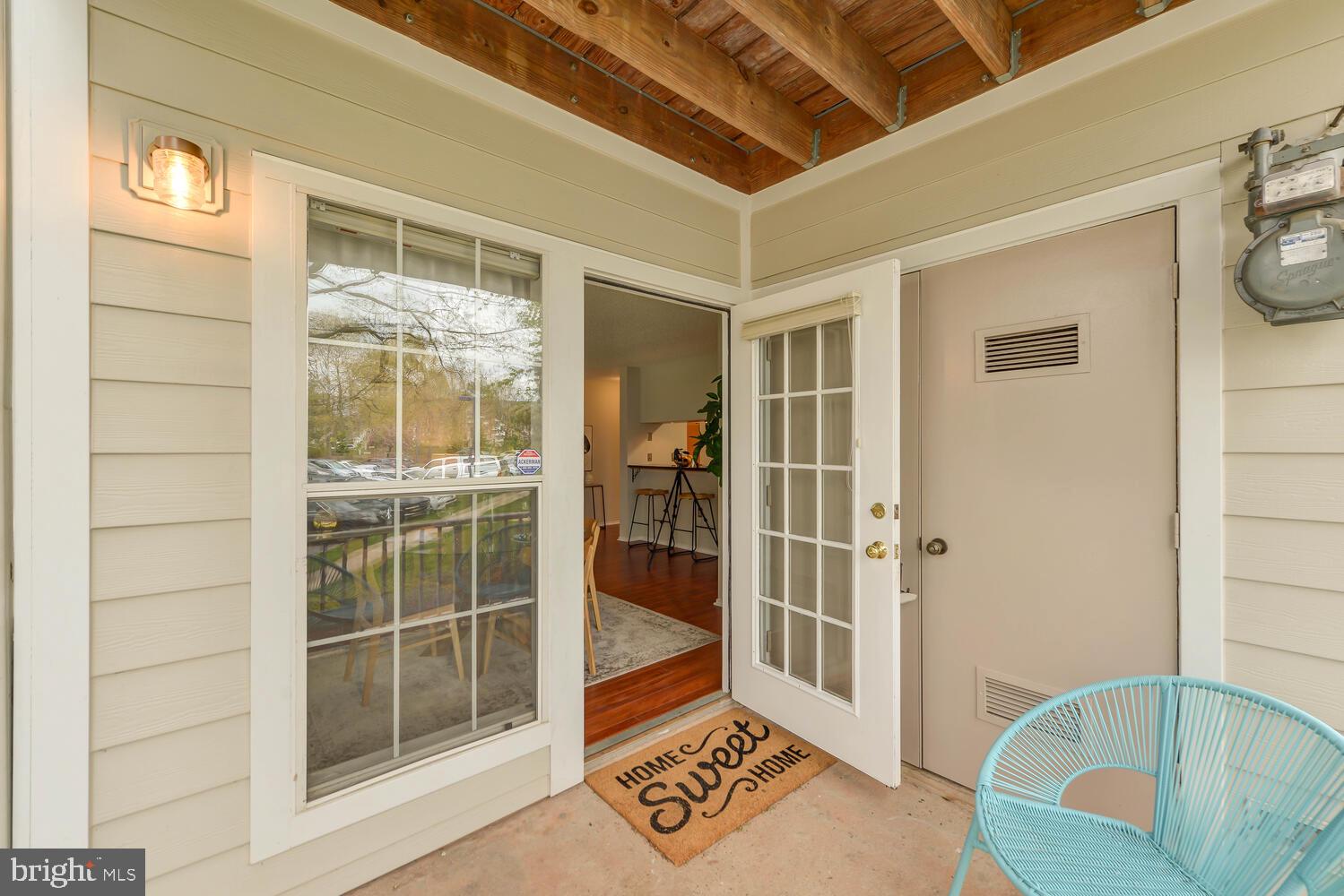 20957 Timber Ridge Terrace, Unit 101 Ashburn, VA 20147 - Photo 4 of 33 French doors to the outside