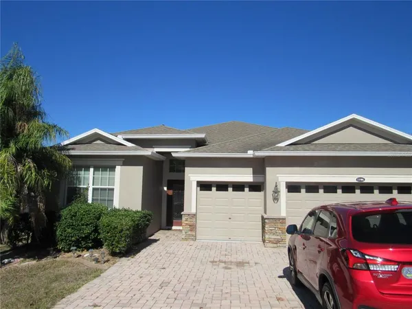 a view of a house with a garage