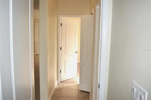 a view of a bathroom from the hallway