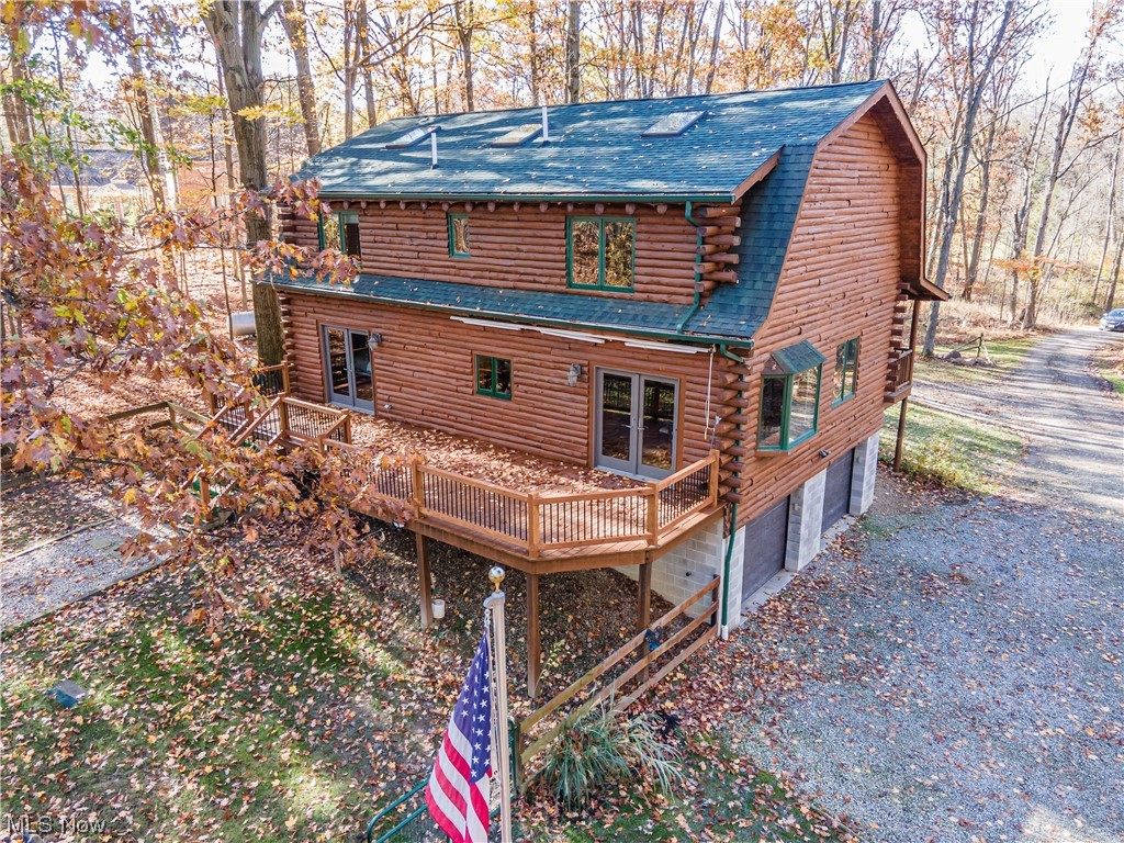 4069 Erhart Road Medina, OH 44256 - Photo 28 of 30 Rear view of house with a wooden deck