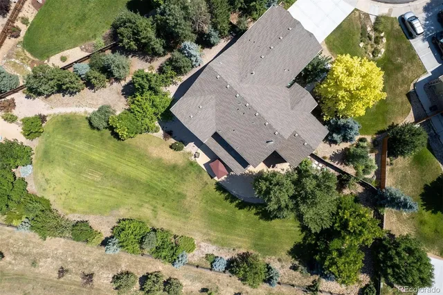 an aerial view of garden with swimming pool
