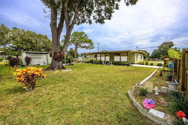 a front view of a house with yard