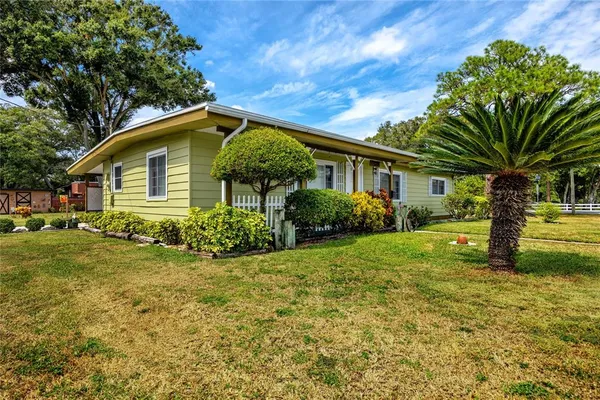 a view of a house with a patio