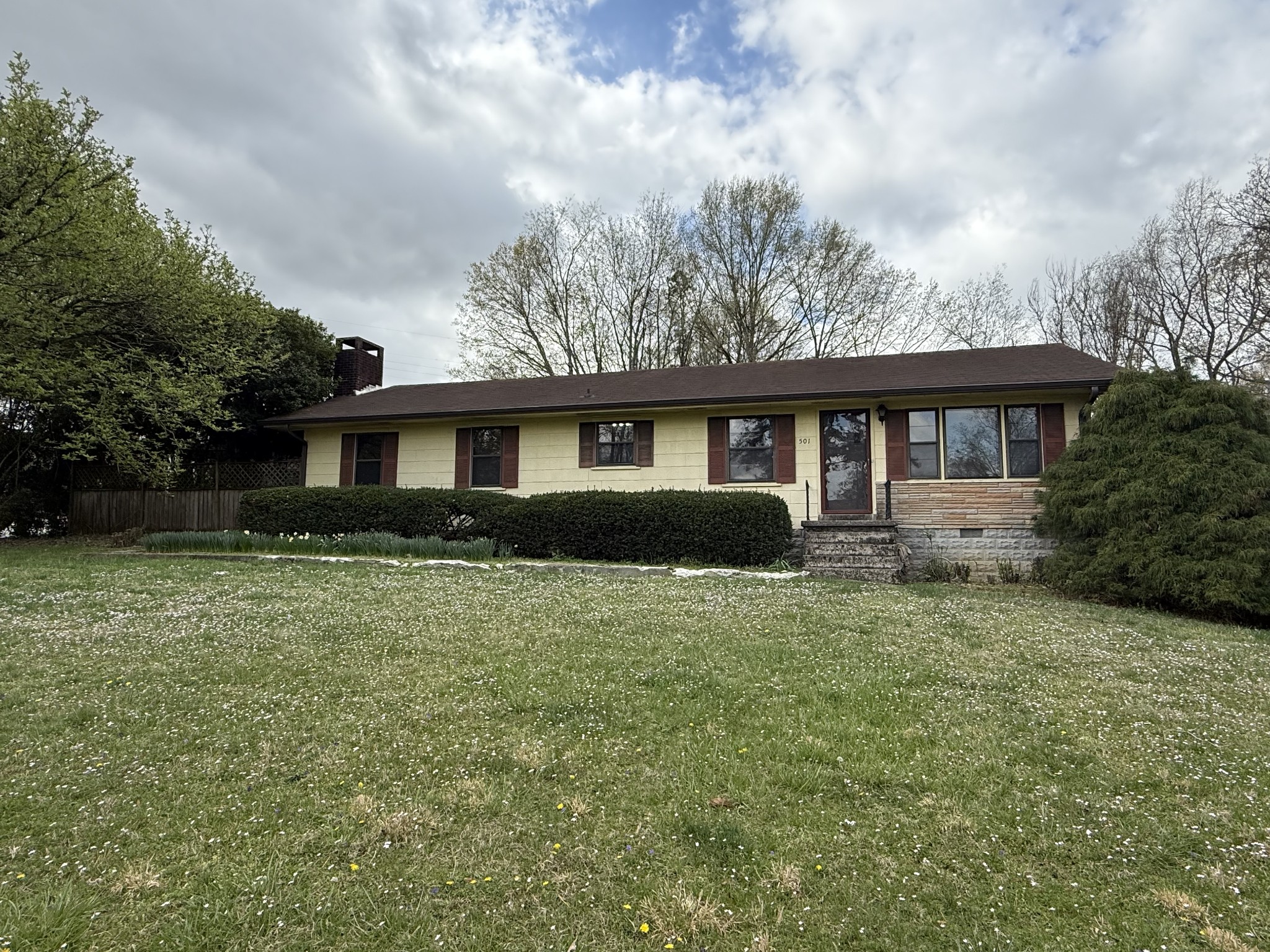 501 Westend Circle Manchester, TN 37355 - Photo 2 of 40 a front view of a house with a yard
