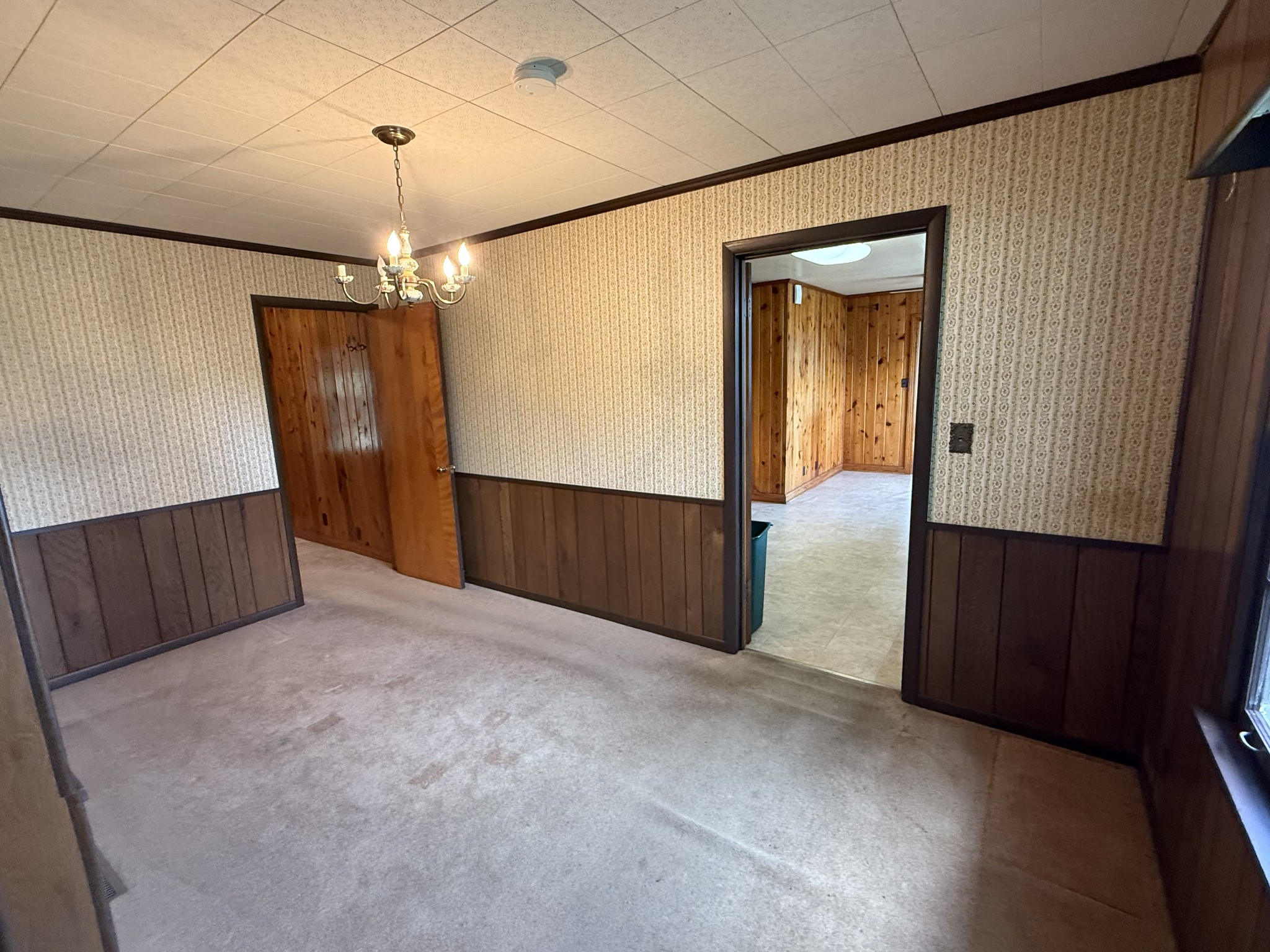 501 Westend Circle Manchester, TN 37355 - Photo 5 of 40 an empty room with ceiling fan and wooden floor