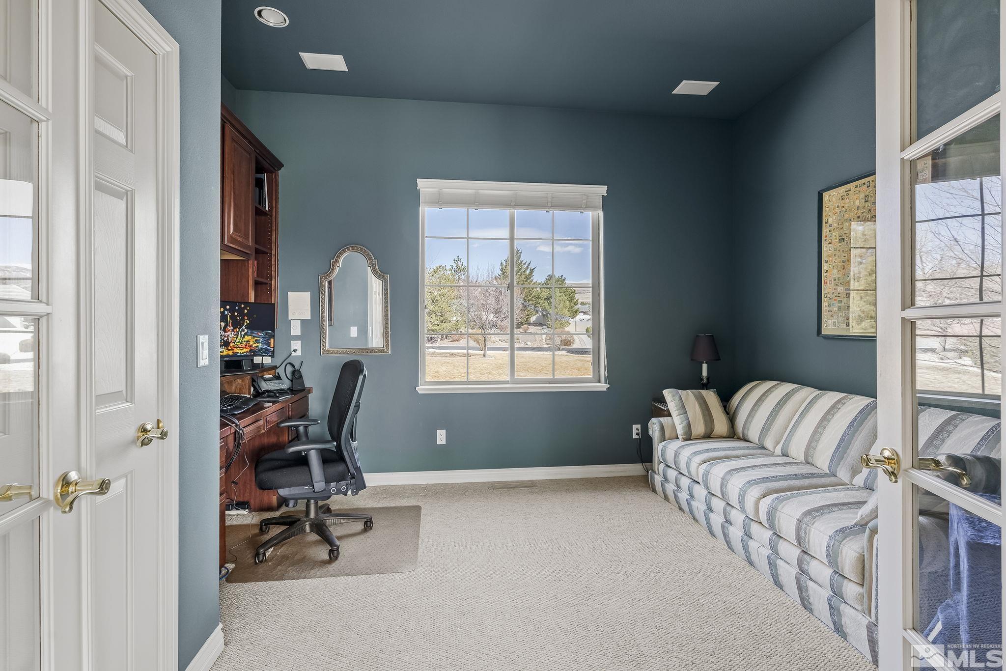 8755 Eaglenest Road Sparks, NV 89436 - Photo 15 of 40 a living room with furniture and a window