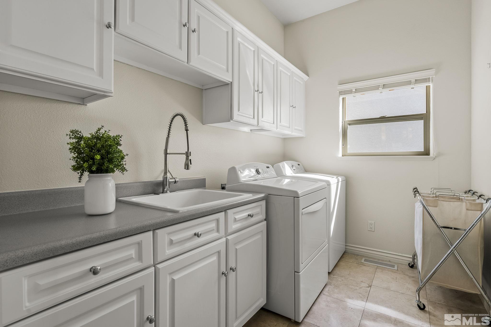 8755 Eaglenest Road Sparks, NV 89436 - Photo 16 of 40 a kitchen with a sink and cabinets