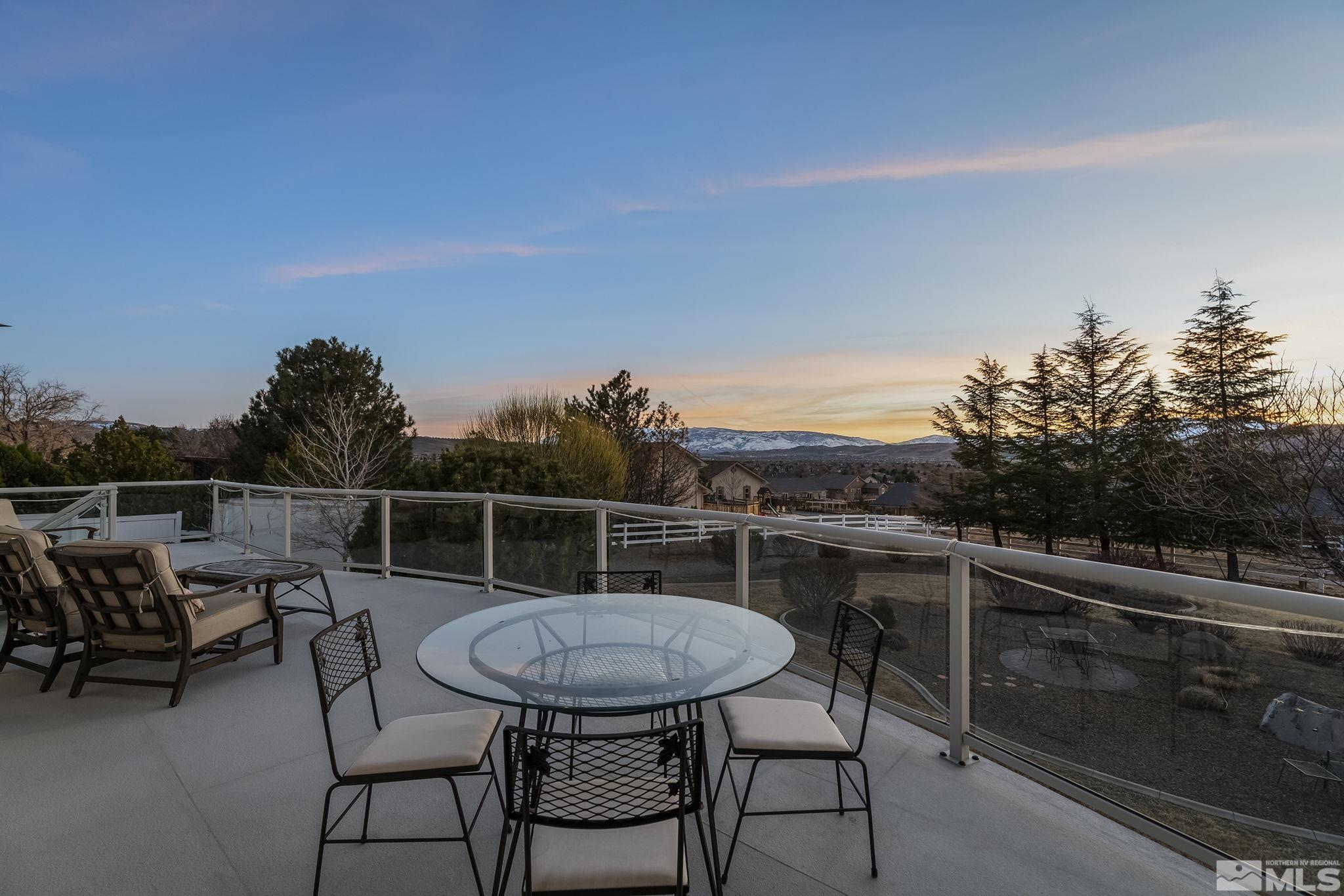 8755 Eaglenest Road Sparks, NV 89436 - Photo 21 of 40 a view of a chairs and table in the terrace