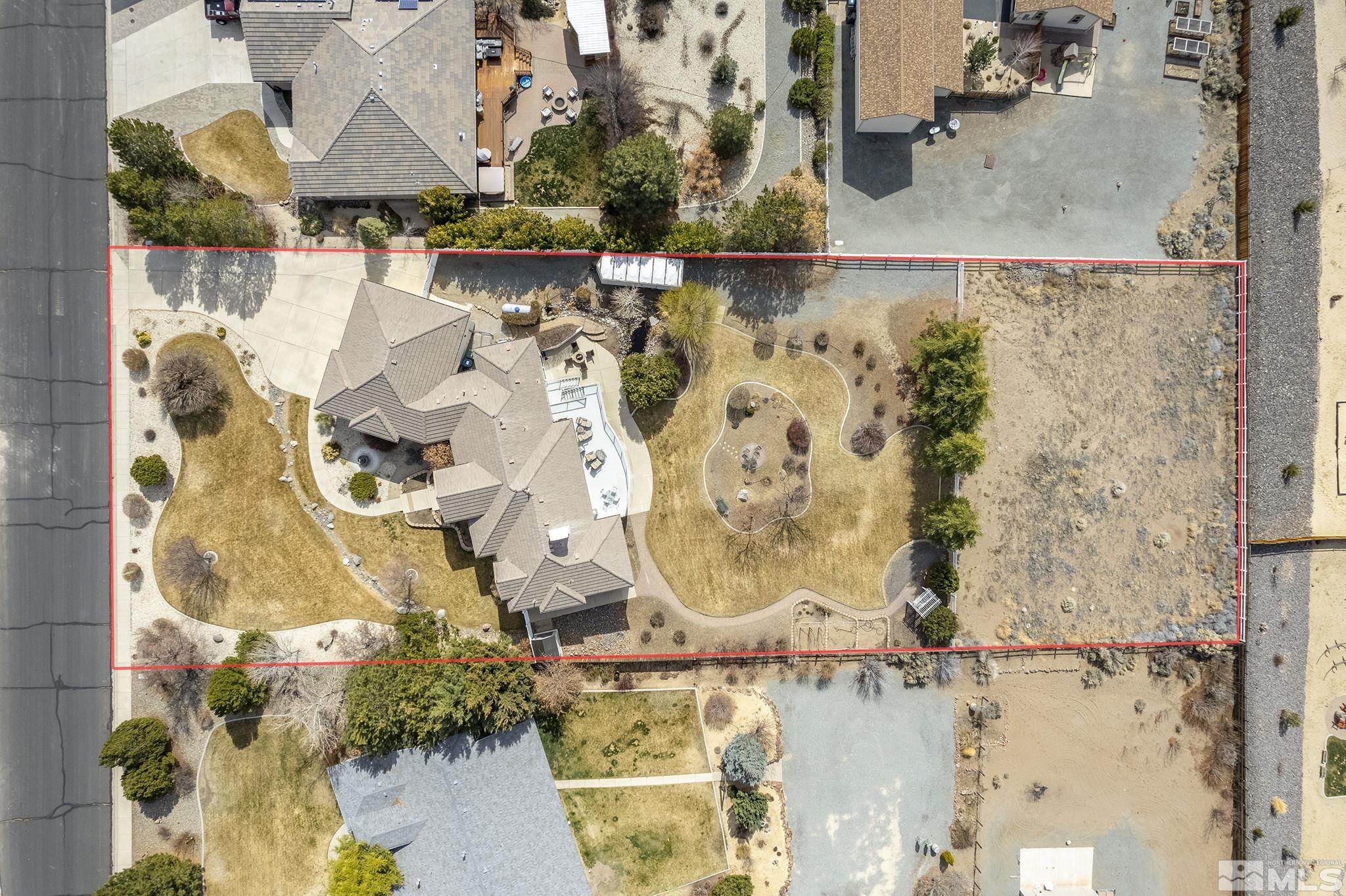 8755 Eaglenest Road Sparks, NV 89436 - Photo 27 of 40 an aerial view of residential houses with outdoor space