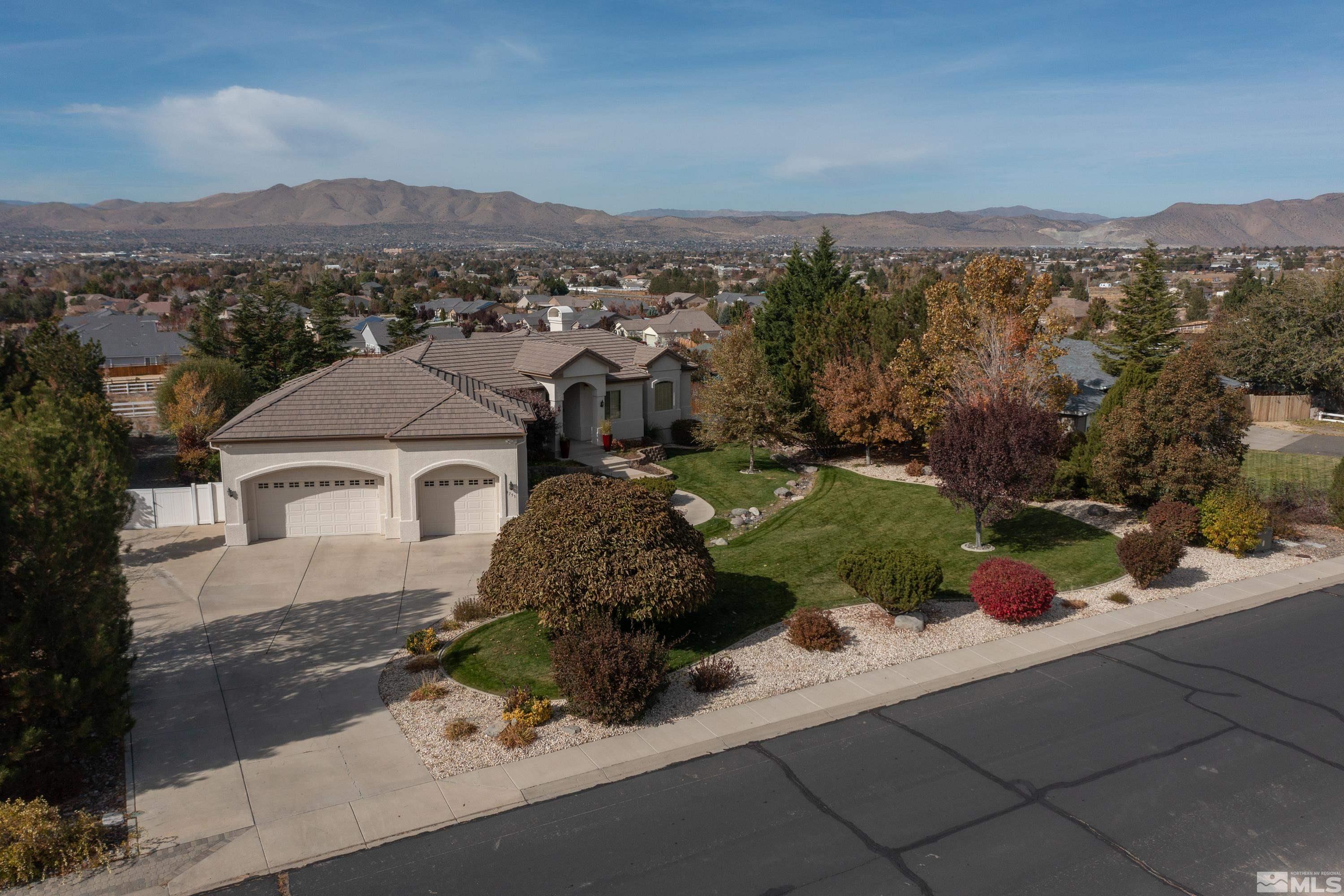 8755 Eaglenest Road Sparks, NV 89436 - Photo 28 of 40 an aerial view of a house with a garden