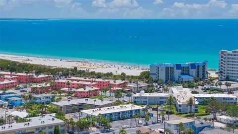 a view of a city with an ocean view