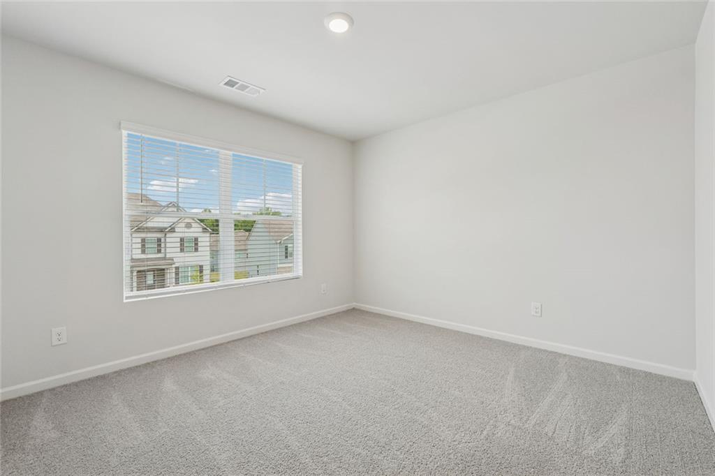 96 Quail Bend Way Dallas, GA 30157 - Photo 31 of 57 an empty room with a window