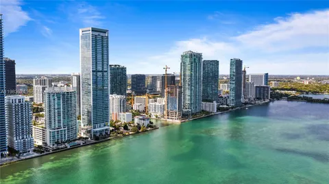 a view of a city with tall buildings