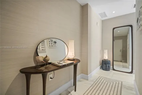 a view of a hallway with elevator