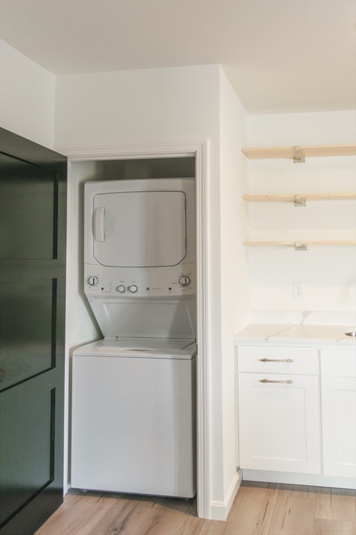 49 Center Street Barnstable, MA 02601 - Photo 12 of 36 a utility room with a washer and dryer