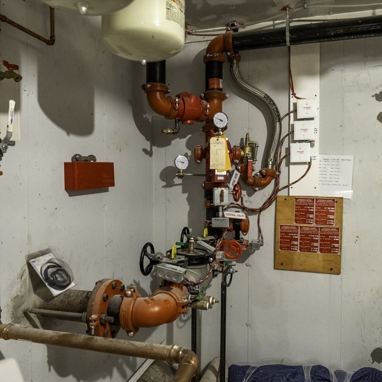 49 Center Street Barnstable, MA 02601 - Photo 29 of 36 a room with gym equipment