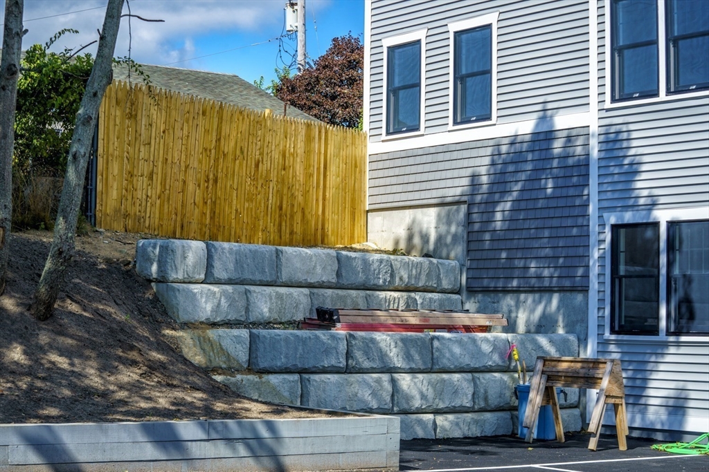 49 Center Street Barnstable, MA 02601 - Photo 36 of 36 a view of a back yard of the house