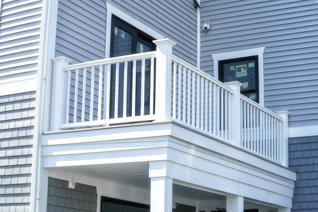 49 Center Street Barnstable, MA 02601 - Photo 9 of 36 a view of wooden balcony