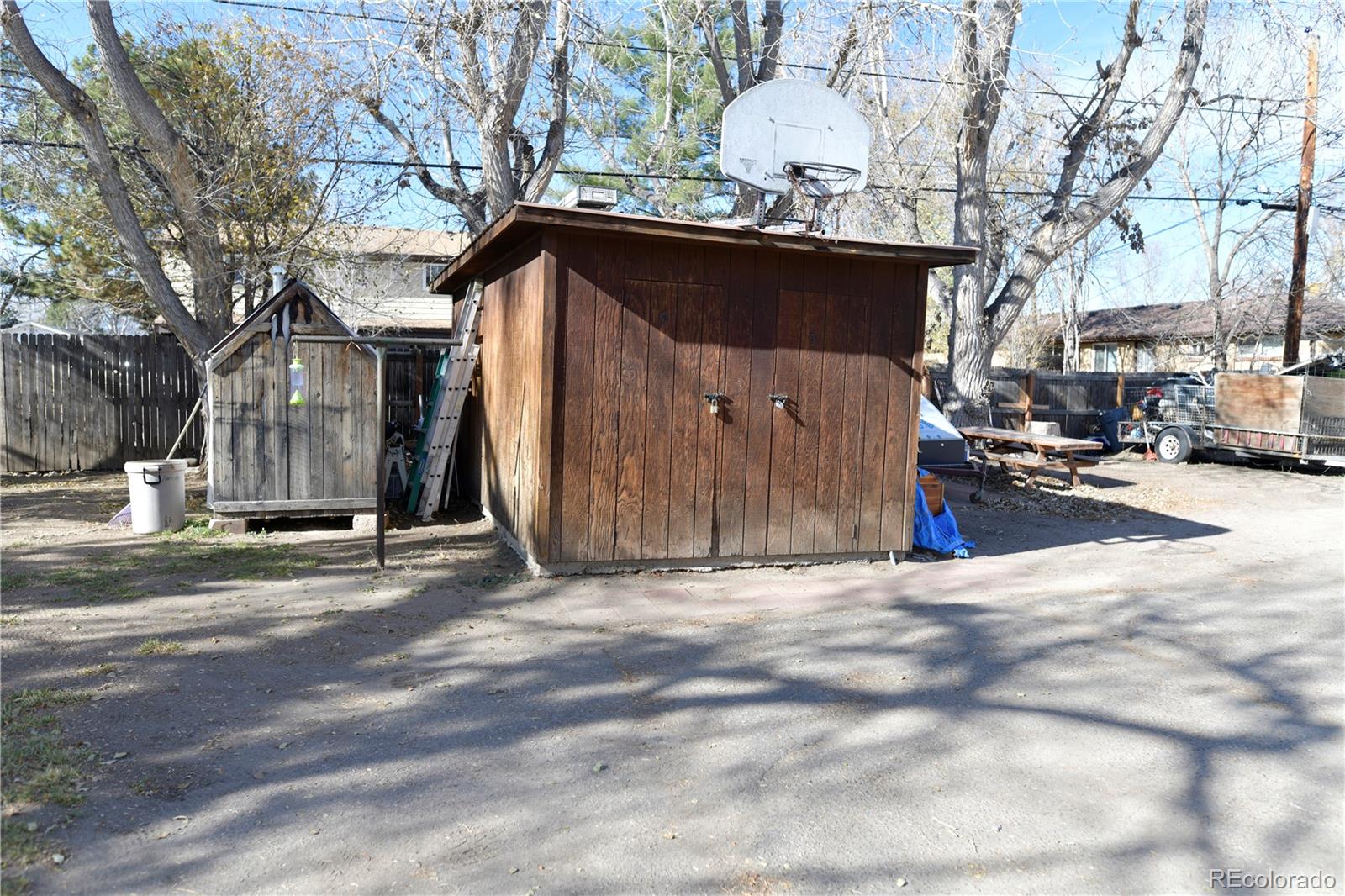 4563 Everett Street Wheat Ridge, CO 80033 - Photo 5 of 10 a view of street with parked cars